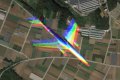 珍事か？Googleマップに虹色の飛行機が写り込む！の写真