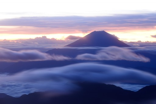 赤石岳より望む富士山と雲海の写真