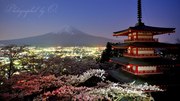 新倉山浅間公園・忠霊塔から望む満開の桜と富士山の写真 「未明の宴」