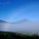 三国峠から見た霧虹の写真 「アーチ」