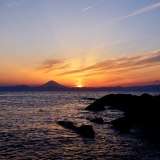 城ヶ島の夕日と富士山の写真 「大海へと堕ちる」