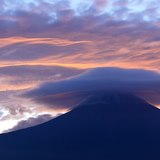 笠雲と朝焼けの富士山の写真 「時空を超えて」